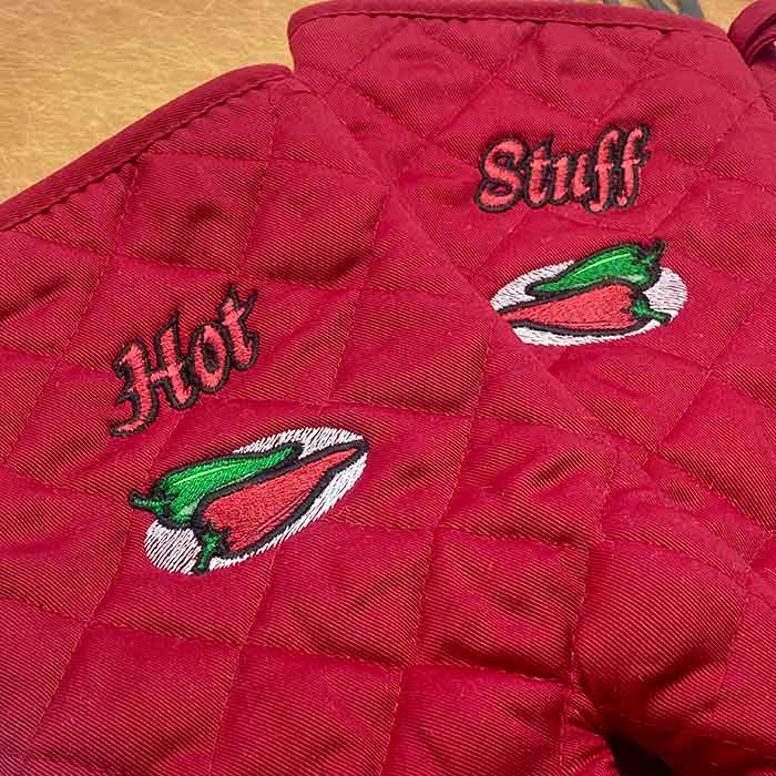 ASPAP12_hotstuff_ovengloves2 | Embroidery Legacy Hot stuff embroidery design oven mitts