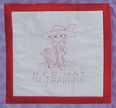 rhquilt2lg | Embroidery Legacy red hat redwork quilt block