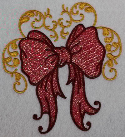 Embroidery Design: Christmas ribbon with swirls<br> 4.57w X 5.13h