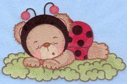 Embroidery Design: Ladybug bear sleeping on grass large<br>7.01w X 5.45h