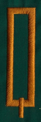 Embroidery Design: OM Center Q<br>0.81" x 2.88" | Embroidery Legacy Embroidery Design: OM Center Q<br>0.81" x 2.88"