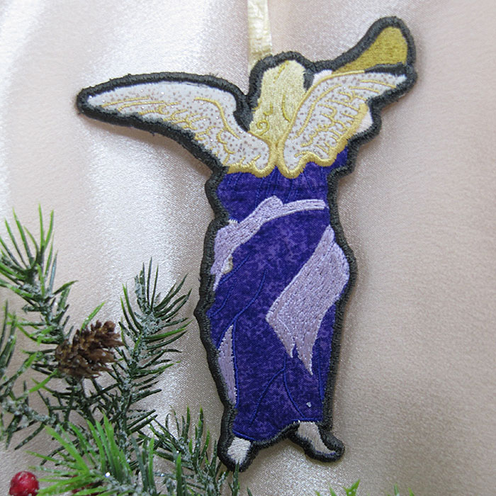 AIHO04A_back | Embroidery Legacy Heavenly Ornaments angel with horn back