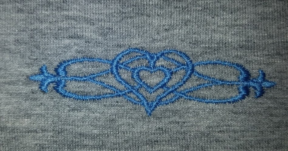 Knitted embroidery fabric with stablizer