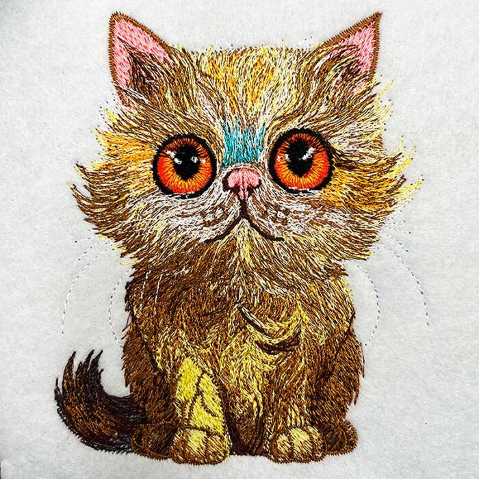 Cuddly orange cat embroidery design