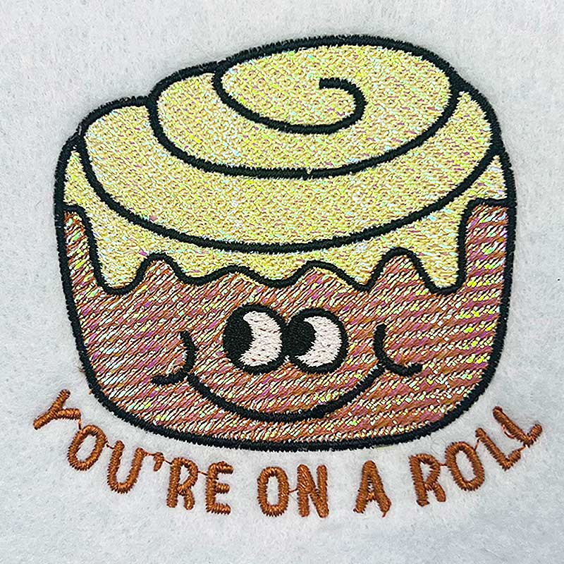 SDRF_YourOnRoll_M | Embroidery Legacy you're on a roll mylar embroidery design