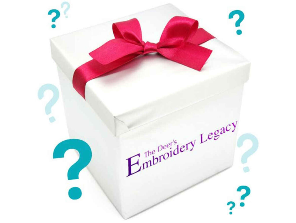 Mystery box with the Embroidery Legacy logo on it