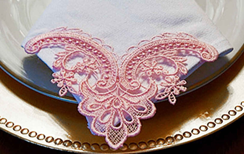 Free standing lace embroidered on napkin