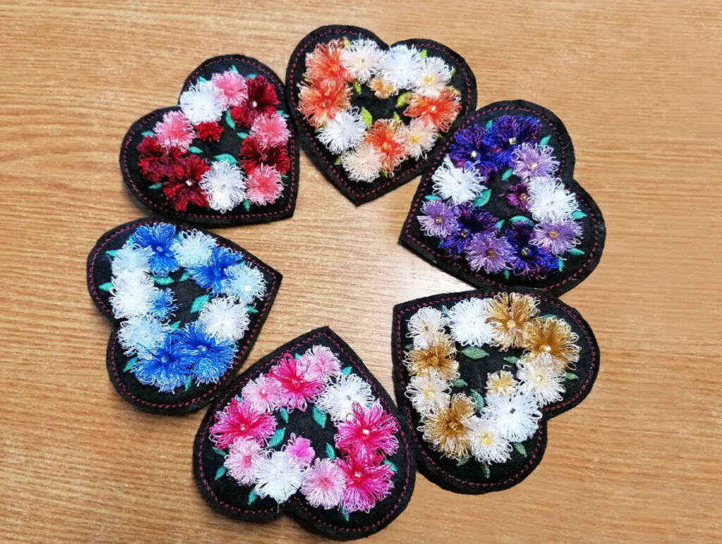 Flower embroidery projects provided as a past monthly in the hoop project bonus