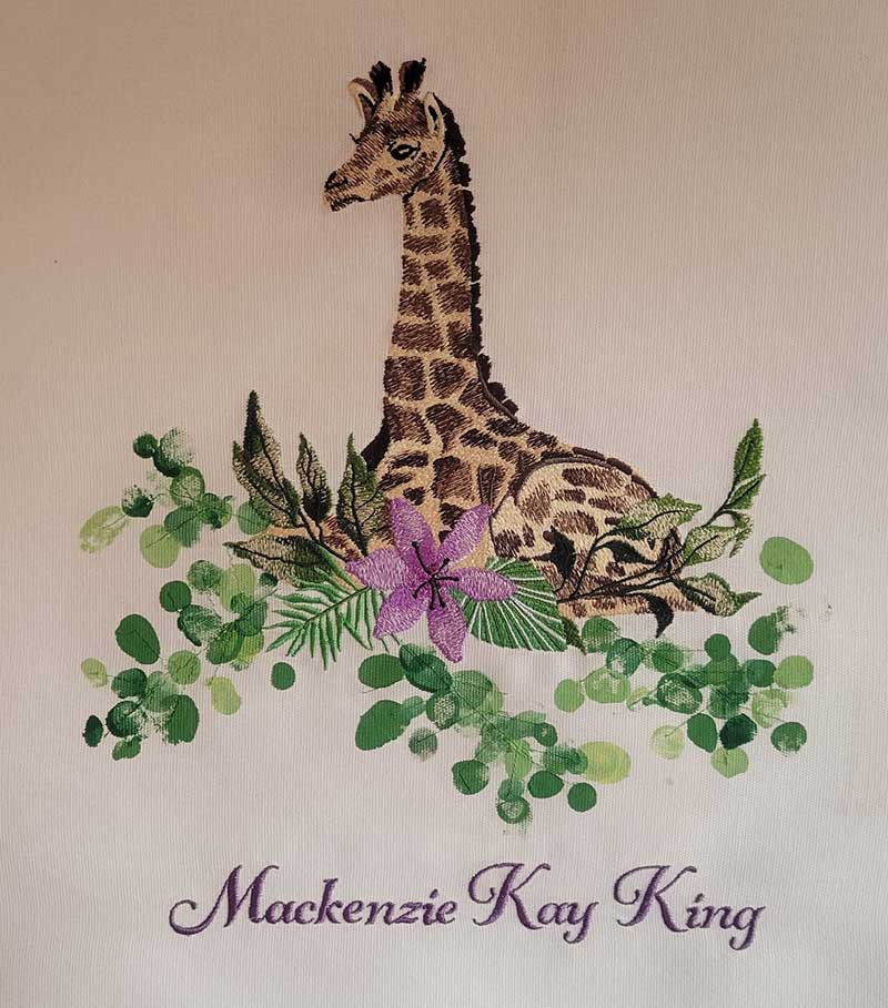 DebbieK-AfricanAnimalsGiraffeWithFlowers | Embroidery Legacy giraffe with flowers