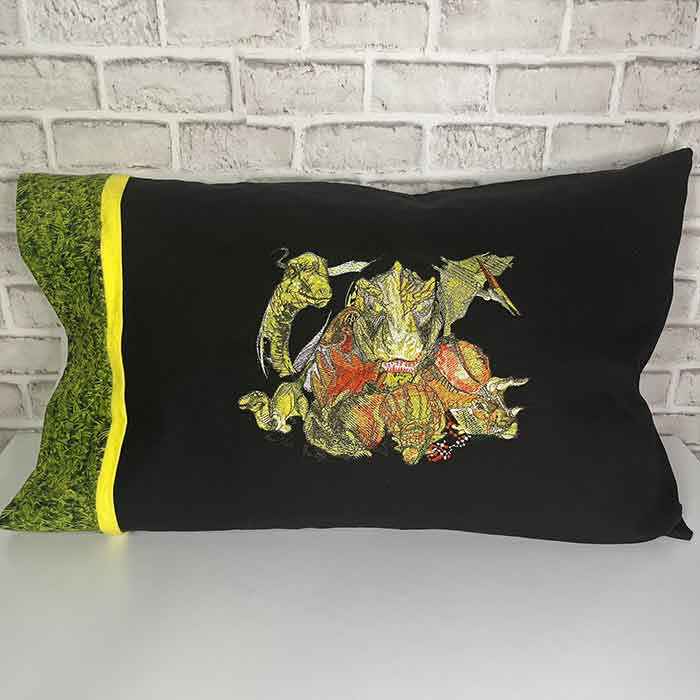 DinosaurPillow | Embroidery Legacy Dinosaur group pillow