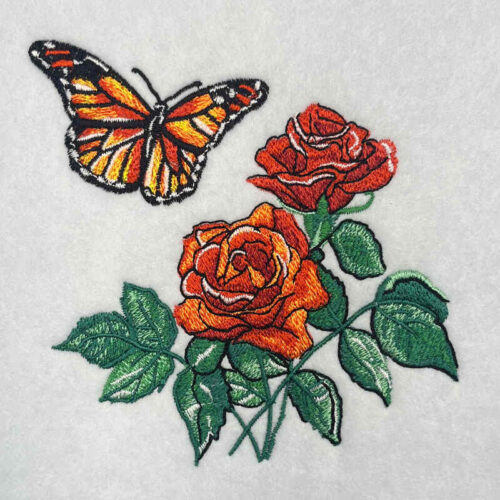 Monarch on rose embroidery design