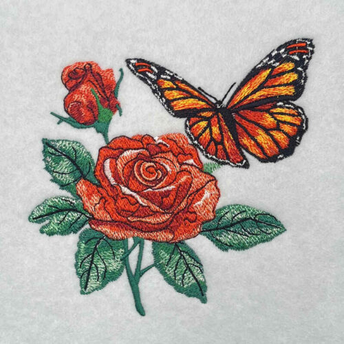 Monarch on rose embroidery design