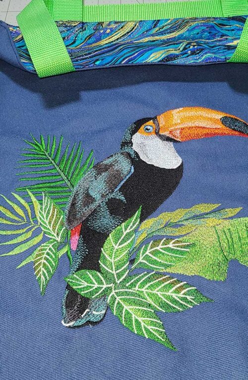 toucan with flowers embroidery design