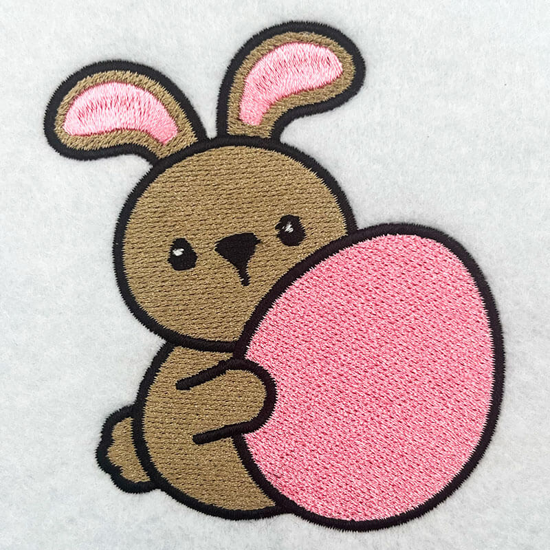 Embroidery Design: Bunny Holding Egg – 3.12w x 3.50h