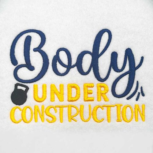 Body under construction embroidery design