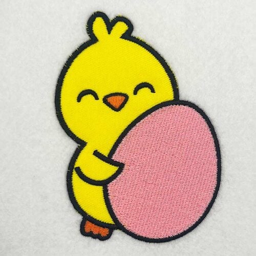 chick holding egg applique embroidery design