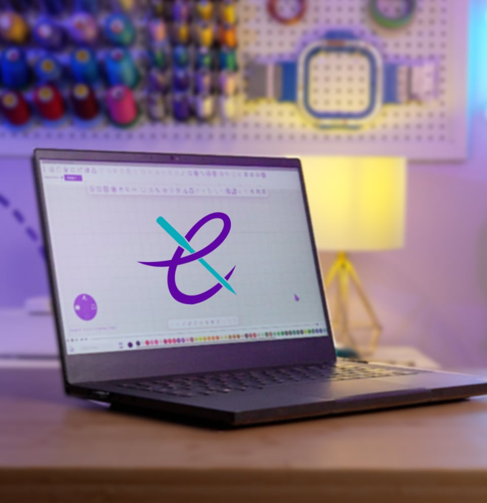 laptop-showing-legacy-software Laptop sitting on a desk showing embroidery legacy's software