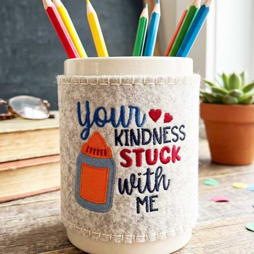 Kindness stuck pencil holder