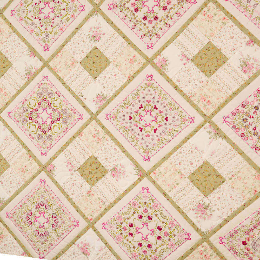 Artboard16 1 1 1 Janet Samson's designs on a quilt