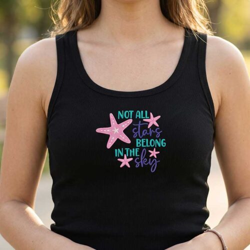 Person wearing a black tank top with teal and pink text reading 'Not all stars belong in the sky' and pink star shapes.