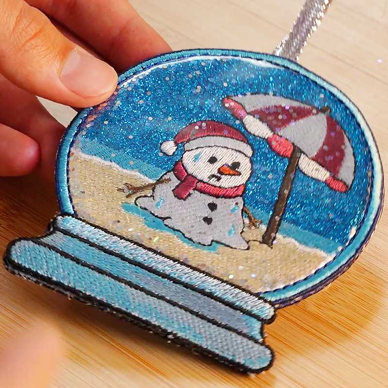 melting snowman globe ornament